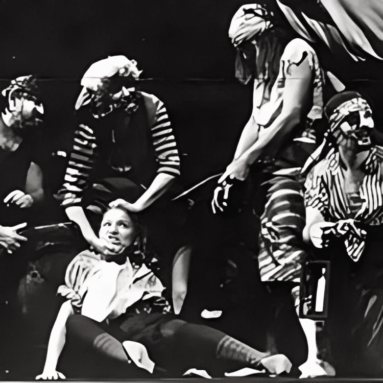 Pirates performing on stage in black and white