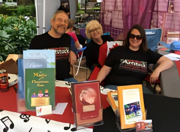 Smiling group at a colorful display