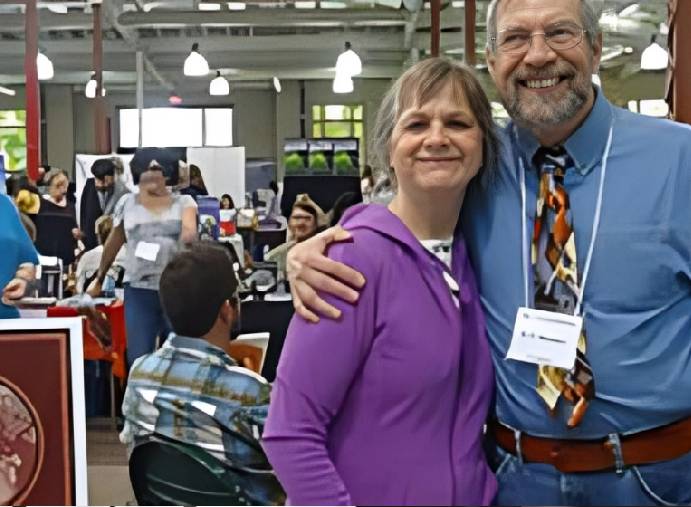 Happy pair posing at a gathering